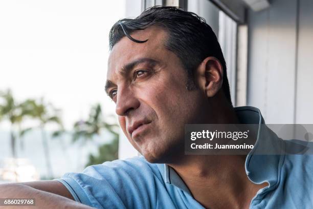 concerned mature man - refugee portrait stock pictures, royalty-free photos & images