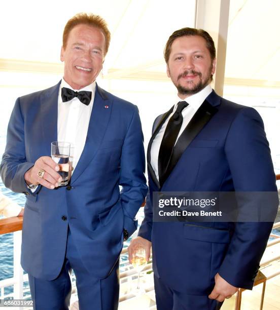 Arnold Schwarzenegger and Michele Malenotti attend the Vanity Fair and HBO Dinner celebrating the Cannes Film Festival at Hotel du Cap-Eden-Roc on...