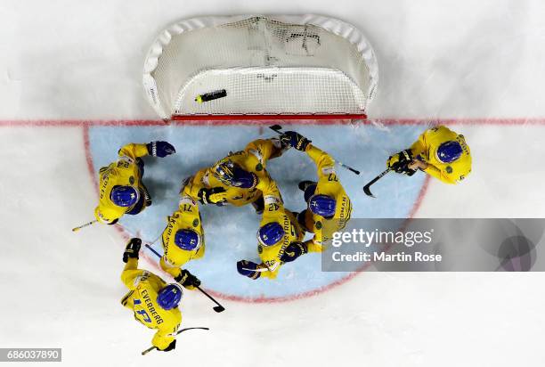 Henrik Lundqvist, goaltender of Sweden celebrate victory over Finland with his team mates after the 2017 IIHF Ice Hockey World Championship semi...