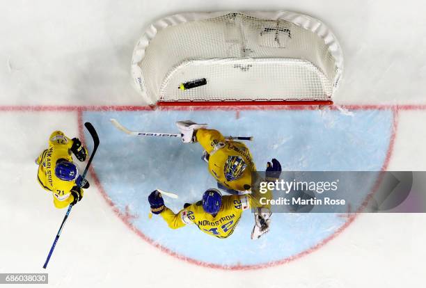 Henrik Lundqvist, goaltender of Sweden celebrate victory over Finland with his team mates after the 2017 IIHF Ice Hockey World Championship semi...