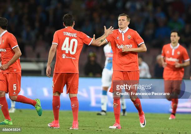 Nenad Tomovic and Josip Ilicic of ACF Fiorentina celebrate the 3-1 goal scored by Josip Ilicic during the Serie A match between SSC Napoli and ACF...