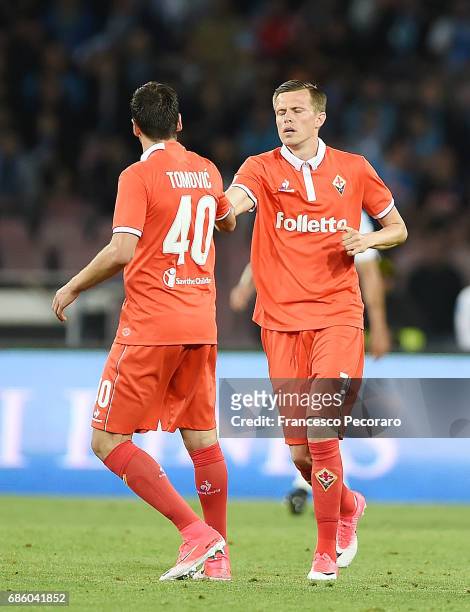 Nenad Tomovic and Josip Ilicic of ACF Fiorentina celebrate the 3-1 goal scored by Josip Ilicic during the Serie A match between SSC Napoli and ACF...