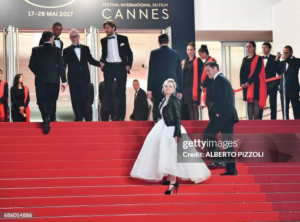 General Delegate of the Cannes Film Festival Thierry Fremaux greets US actor Terry Notary, Danish actor Christopher Læsso, Swedish director Ruben...