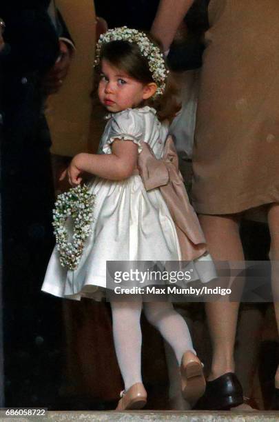 Princess Charlotte of Cambridge attends the wedding of Pippa Middleton and James Matthews at St Mark's Church on May 20, 2017 in Englefield Green,...