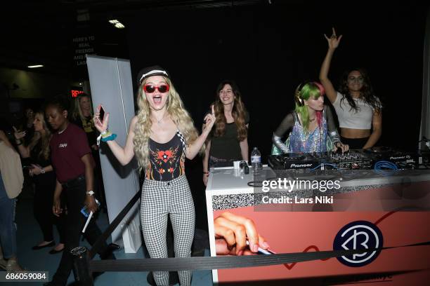 Actress Bella Thorne and Dani Thorne perform during Beautycon Festival NYC 2017 at Brooklyn Cruise Terminal on May 20, 2017 in New York City.