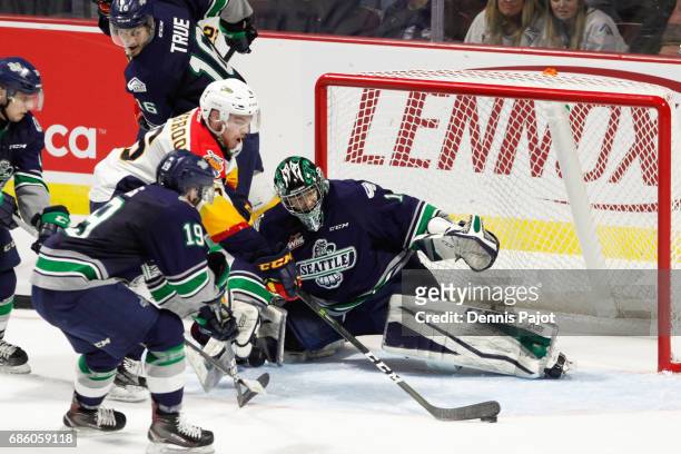 Forward Jordan Sambrook of the Erie Otters scores his second period goal against goaltender Carl Stankowski of the Seattle Thunderbirds on May 20,...
