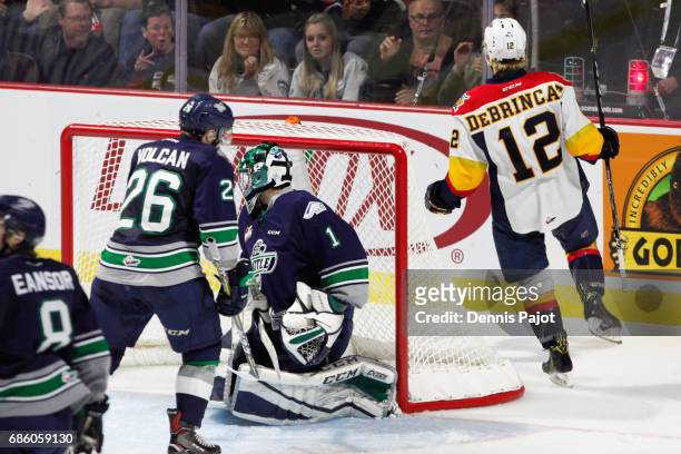 Forward Alex DeBrincat of the Erie Otters celebrates his second period goal against goaltender Carl Stankowski of the Seattle Thunderbirds on May 20,...
