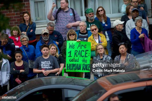 Demonstrators attend a counter protest rally, organized by the NAACP, in response of a planned Klu Klux Klan rally to be held nearby May 20, 2017 in...