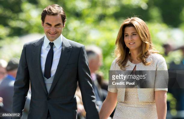 Roger Federer and Mirka Federer attend the wedding of Pippa Middleton and James Matthews at St Mark's Church on May 20, 2017 in Englefield Green,...
