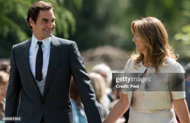 Roger Federer and Mirka Federer attend the wedding of Pippa Middleton and James Matthews at St Mark's Church on May 20, 2017 in Englefield Green,...