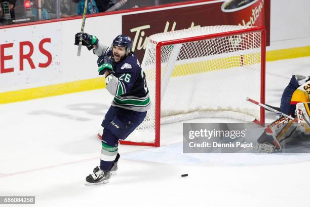 Forward Nolan Volcan of the Seattle Thunderbirds celebrates a second period goal by teammate Scott Eansor against the Erie Otters on May 20, 2017...