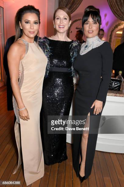 Eva Longoria, Julianne Moore, and Salma Hayek Pinault attend the Vanity Fair and HBO Dinner celebrating the Cannes Film Festival at Hotel du...
