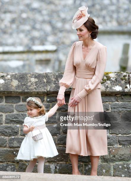 Catherine, Duchess of Cambridge and Princess Charlotte of Cambridge attend the wedding of Pippa Middleton and James Matthews at St Mark's Church on...