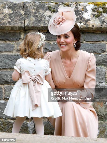 Catherine, Duchess of Cambridge and Princess Charlotte of Cambridge attend the wedding of Pippa Middleton and James Matthews at St Mark's Church on...