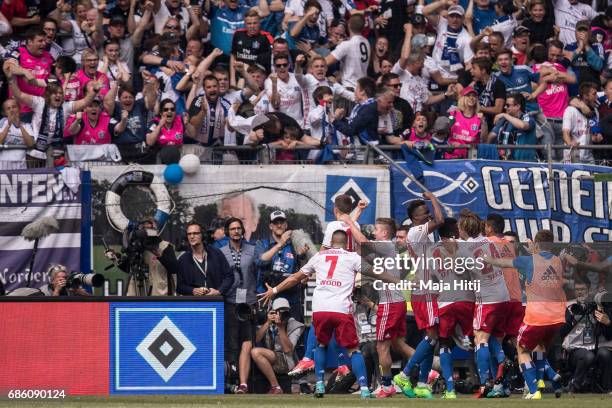 Team of Hamburg celebrates after scoring a goal to make it 2-1 during the Bundesliga match between Hamburger SV and VfL Wolfsburg at Volksparkstadion...