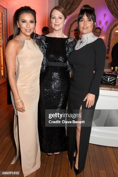 Eva Longoria, Julianne Moore, and Salma Hayek Pinault attend the Vanity Fair and HBO Dinner celebrating the Cannes Film Festival at Hotel du...