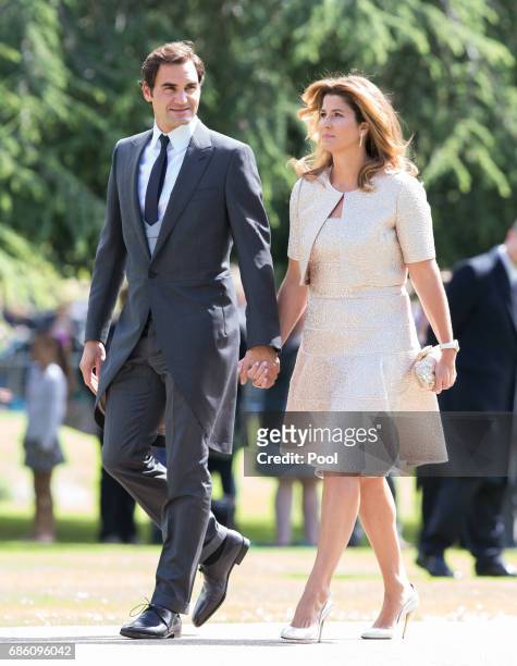 Roger Federer and Mirka Federer attend the wedding Of Pippa Middleton and James Matthews at St Mark's Church on May 20, 2017 in Englefield Green,...