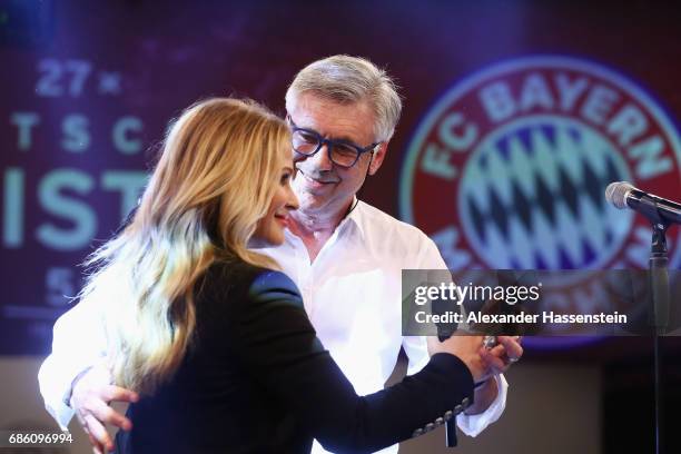 Head coach Carlo Ancelotti and Anastacia perform on stage during the FC Bayern Muenchen Championship party following the Bundesliga match between...