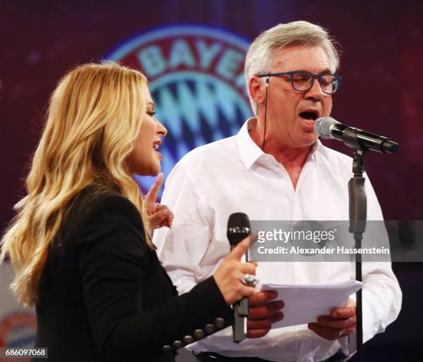Head coach Carlo Ancelotti and Anastacia perform on stage during the FC Bayern Muenchen Championship party following the Bundesliga match between...