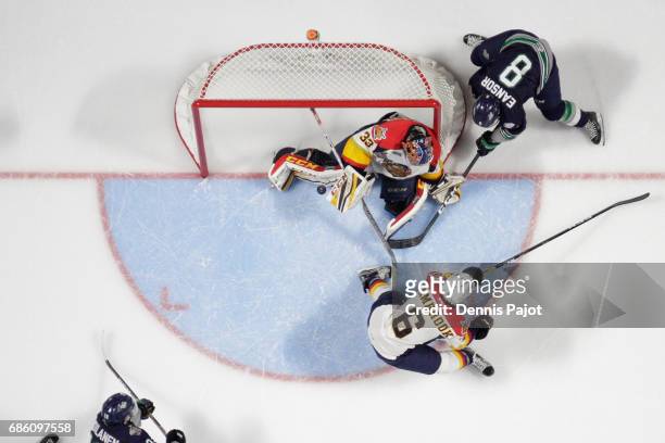 Goaltender Troy Timpano of the Erie Otters makes a save on a wrap around attempt from forward Scott Eansor of the Seattle Thunderbirds on May 20,...