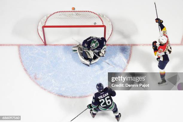 Forward Alex DeBrincat of the Erie Otters celebrates his second period goal against goaltender Carl Stankowski of the Seattle Thunderbirds on May 20,...