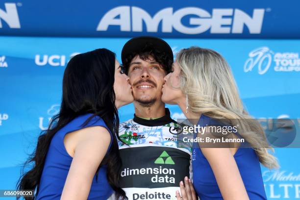 Lachlan Morton of Australia riding for Team Dimension Data in the TAG Heuer Best Young Rider jersey poses for a photo on the stage following the 2017...