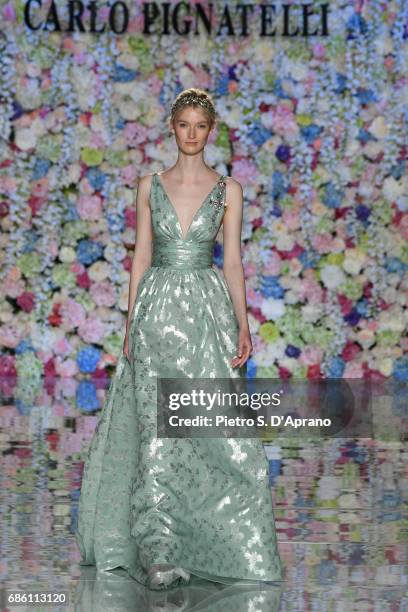 Model walks the runway of the Carlo Pignatelli Haute Couture fashion show on May 20, 2017 in Milan, Italy.