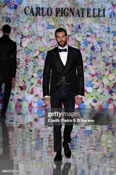 Model walks the runway of the Carlo Pignatelli Haute Couture fashion show on May 20, 2017 in Milan, Italy.
