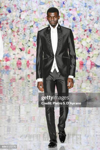 Model walks the runway of the Carlo Pignatelli Haute Couture fashion show on May 20, 2017 in Milan, Italy.