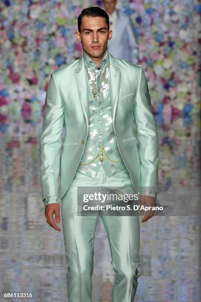 Model walks the runway of the Carlo Pignatelli Haute Couture fashion show on May 20, 2017 in Milan, Italy.