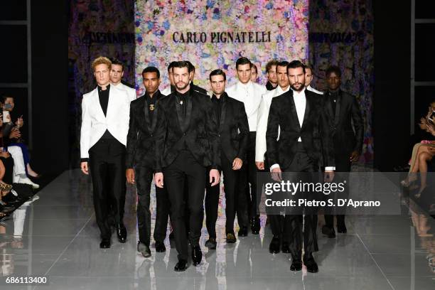 Models walk the runway of the Carlo Pignatelli Haute Couture fashion show on May 20, 2017 in Milan, Italy.