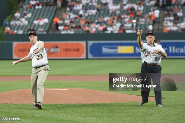 Maryland Senators Chris Van Hollen and Ben Cardin throw out the first pitch before a baseball game between the Baltimore Orioles and the Toronto Blue...