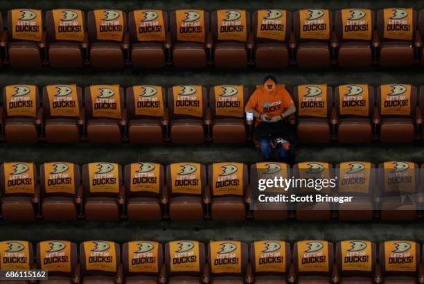 An Anaheim Ducks fan waits for the game to start between the Anaheim Ducks and the Nashville Predators in Game Five of the Western Conference Final...