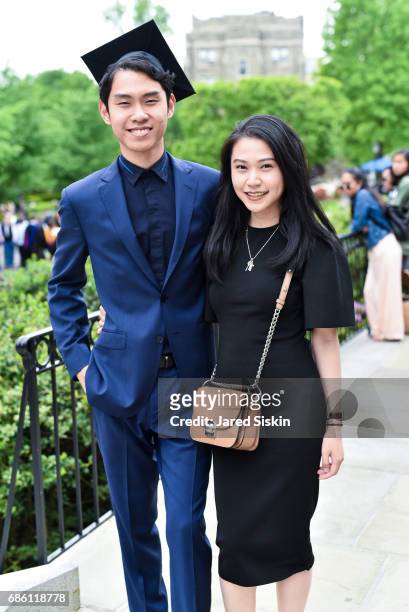 Filbert Nickolas is seen wearing a Givenchy shirt and a Hugo Boss suit with Nadya Lumanpauw who is accesorizing a prada bag and a Hermes Watch at...