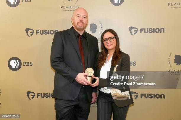 Louis C.K. And Pamela Adlon pose with an award during The 76th Annual Peabody Awards Ceremony at Cipriani, Wall Street on May 20, 2017 in New York...