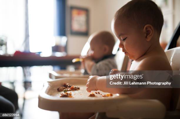 8 month Fraternal Twin Boys Eat Together