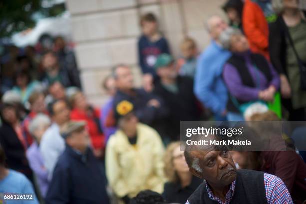 Demonstrators attend a counter protest rally, organized by the NAACP, in response of a planned Klu Klux Klan rally to be held nearby May 20, 2017 in...