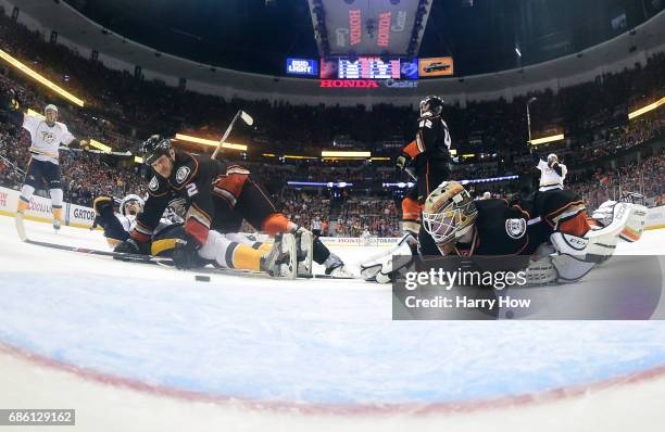 Pontus Aberg of the Nashville Predators reacts from the ice after scoring a goal against goaltender Jonathan Bernier of the Anaheim Ducks in the...