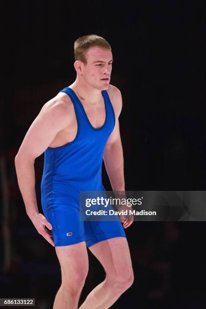 Cael Sanderson of the United States wrestles Semen Semenok of Belarus during the freestyle wrestling event of the Titan Games on February 15, 2003 at...