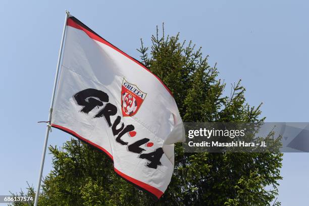The Grulla Morioka flag waves prior to the J.League J3 match between Grulla Moroika and FC Tokyo U-23 at Iwagin Stadium on May 21, 2017 in Morioka,...