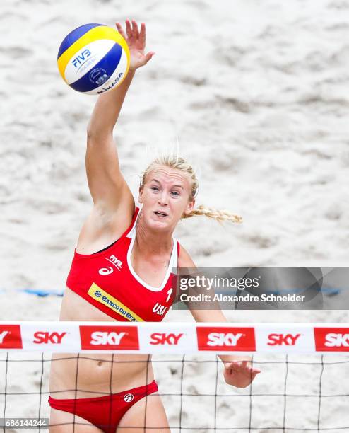 Sarah Hughes of the United States spikes the ball during the quarer finals match against Brazil at Parque Olimpico during day three of the FIVB Beach...