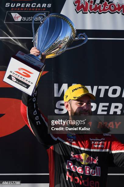 Shane Van Gisbergen driver of the Red Bull Holden Racing Team Holden Commodore VF celebrates after winning race 10 for the Winton SuperSprint, which...