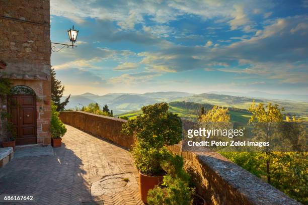 landscape in tuscany, view from the walls of pienza, italy - pienza stockfoto's en -beelden