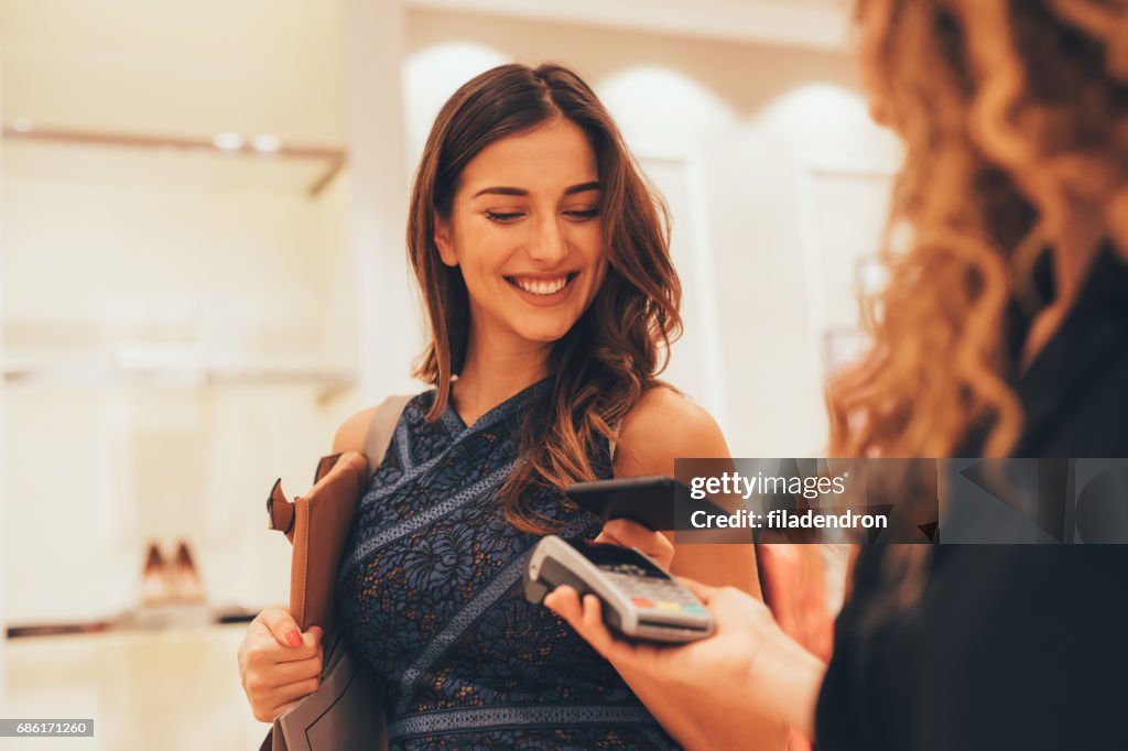Paying via smart phone at a clothing store
