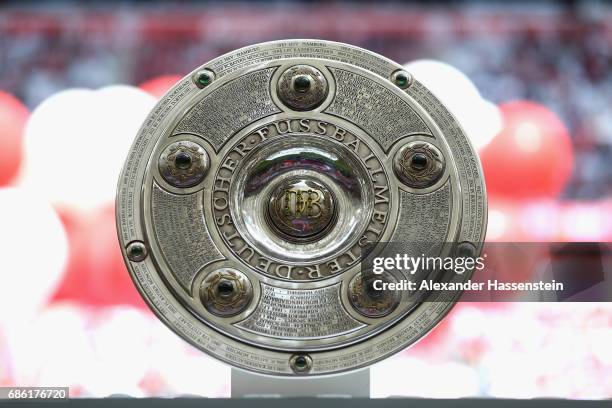 The German Championship trophy is displayed prior to the Bundesliga match between Bayern Muenchen and SC Freiburg at Allianz Arena on May 20, 2017 in...