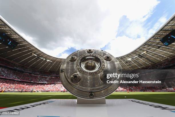 The German Championship trophy is displayed prior to the Bundesliga match between Bayern Muenchen and SC Freiburg at Allianz Arena on May 20, 2017 in...