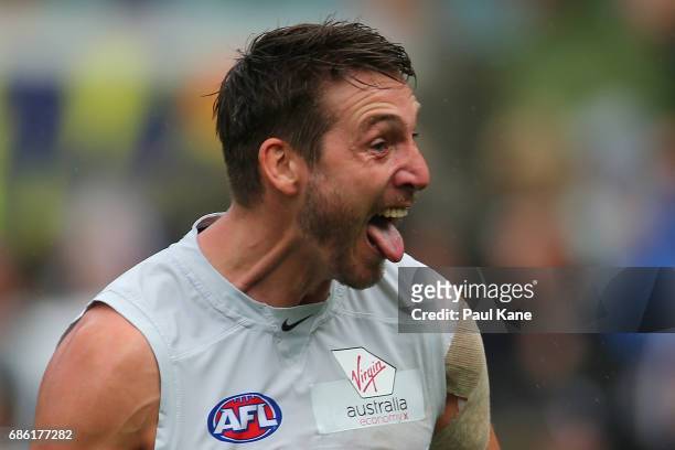 Dale Thomas of the Blues celebrates a goal during the round nine AFL match between the Fremantle Dockers and the Carlton Blues at Domain Stadium on...