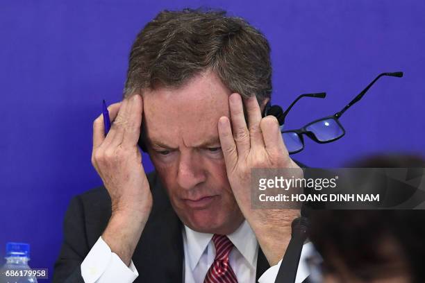 Trade Representative Robert Lighthizer gestures while attending a joint press conference held on the sidelines of the Asia-Pacific Economic...