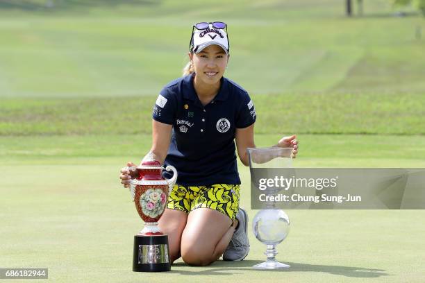 Momoko Ueda of Japan pose with trophy during a ceremony following the Chukyo Television Bridgestone Ladies Open at the Chukyo Golf Club Ishino Course...