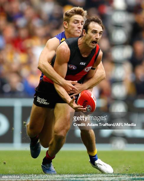 Jobe Watson of the Bombers and Brad Sheppard of the Eagles compete for the ball during the 2017 AFL round 09 match between the Essendon Bombers and...